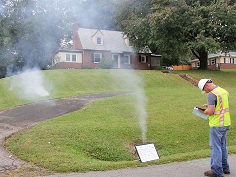sewer-smoke-testing-front-lawn.jpg